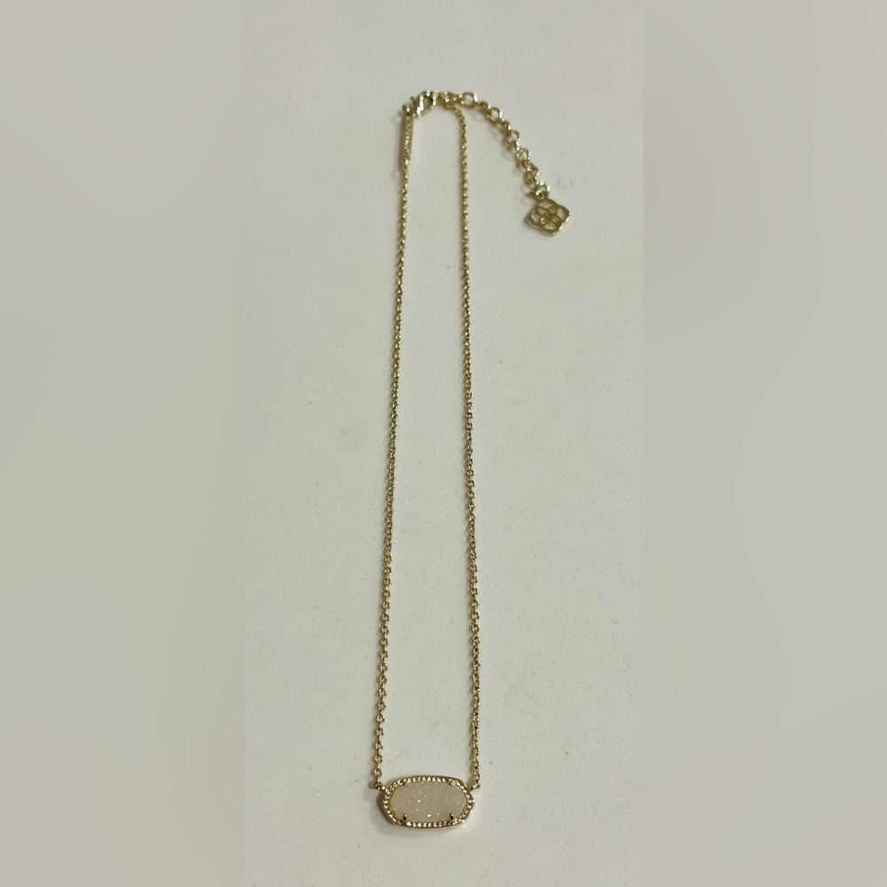 Kendra Scott Elisa Gold Pendant Necklace, featuring a dainty stone. Adjustable
